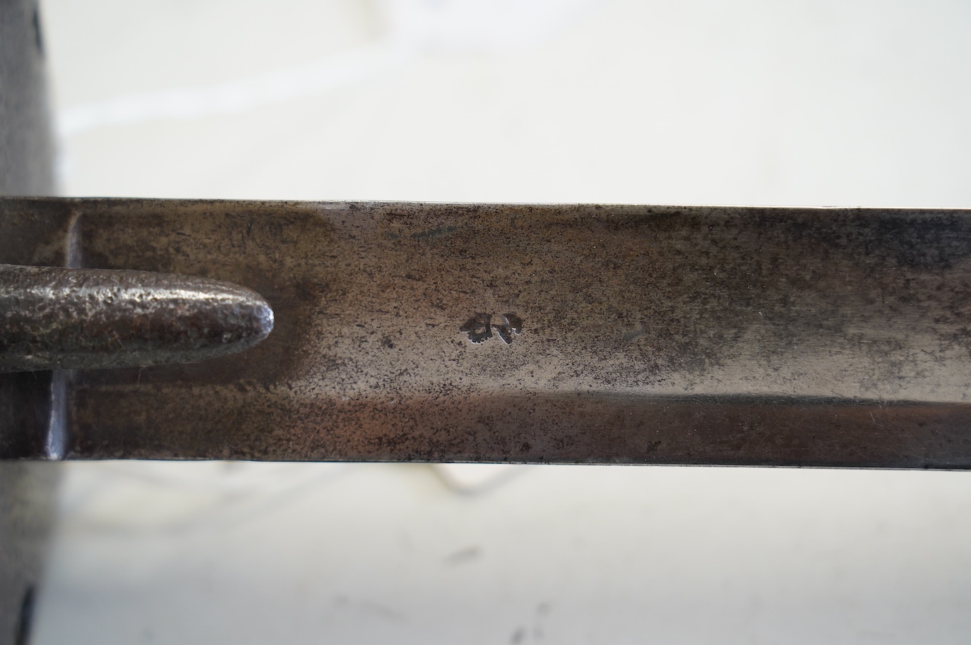 A 1796 pattern heavy cavalry trooper's sword with proof marks, blade 88cm. Condition - hilt heavily pitted, blade tip slightly modified, some worm damage to grip, etc.